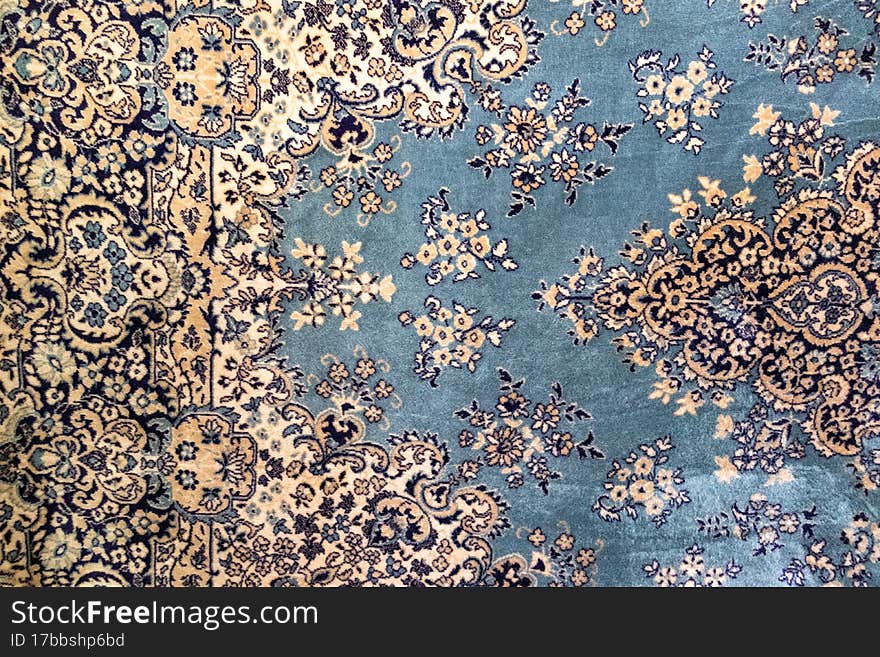 Texture of an old carpet with a Soviet pattern. Texture of an old carpet with a Soviet pattern.