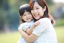 Smiley Parent And Child Stock Images