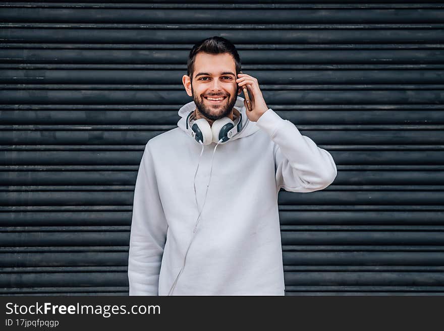 Young man talking on mobile phone. Young man talking on mobile phone