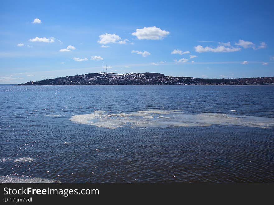 an ice floe floats on the river