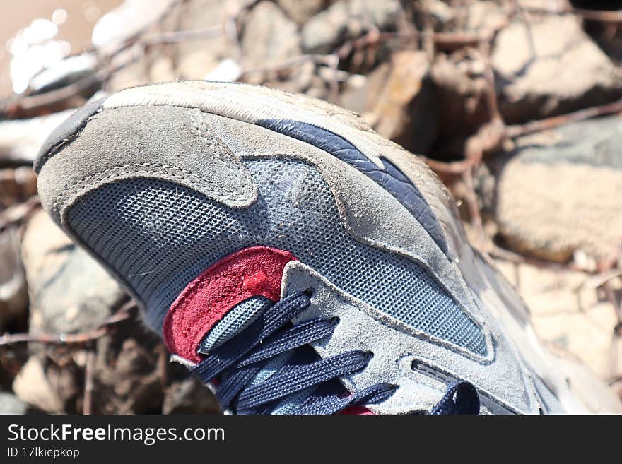 A Hole In A Running Shoe