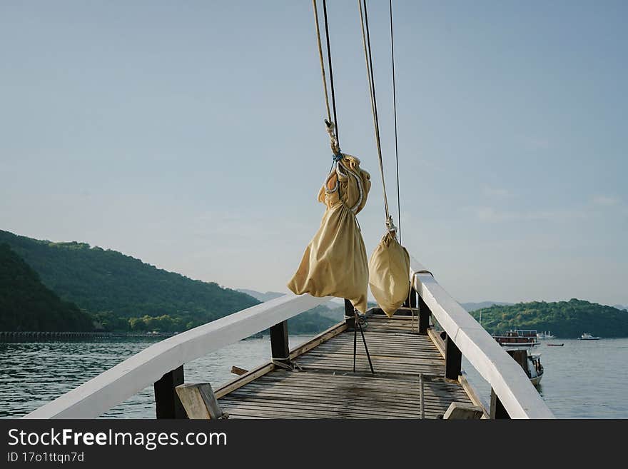 the sails of the folded boat. The ship docked. preparation for sailing. the sails of the folded boat. The ship docked. preparation for sailing.