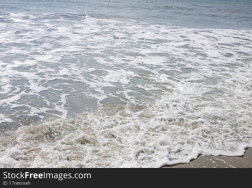 The water waves at the Atlantic Ocean