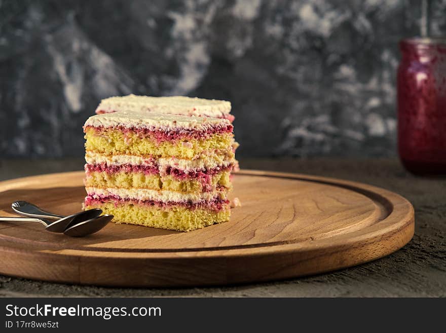 Delicious dessert biscuit with raspberries and green fragrant tea, home decor, gray background