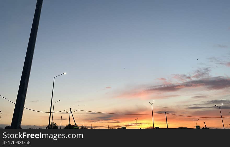 Evening sunset, the sky was painted in bright colors when the sun went down below the horizon.