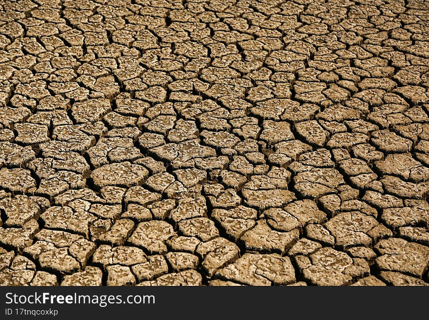 Cracked, parched land after a drought. Cracked, parched land after a drought