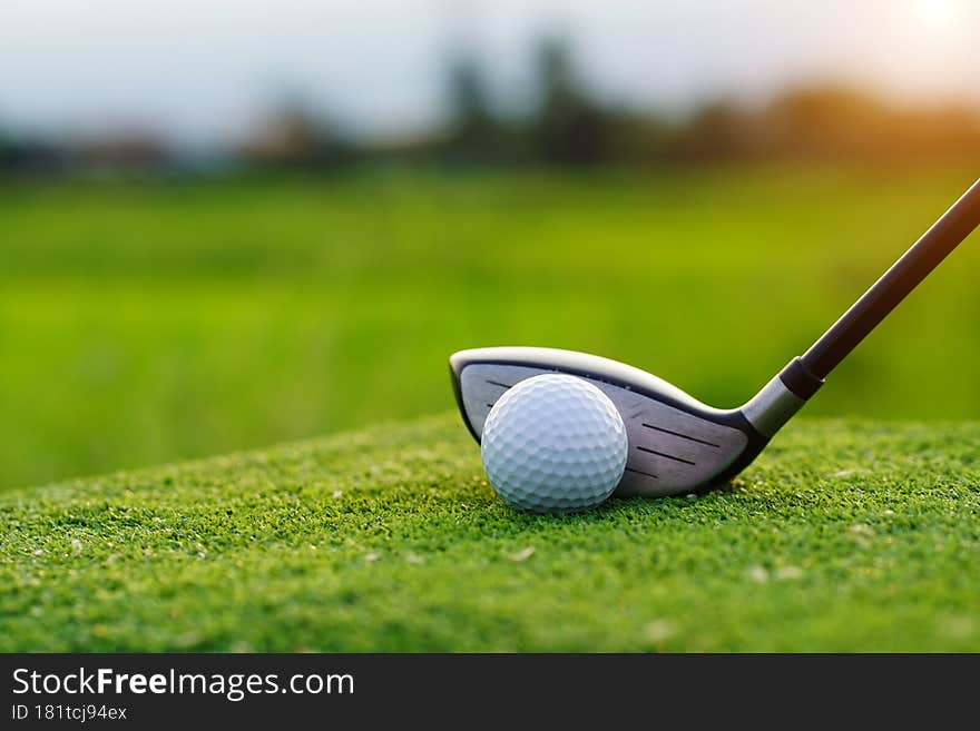 Golf balls on the golf course with golf clubs ready for golf in the first short. In the morning, with the beautiful sunlight.