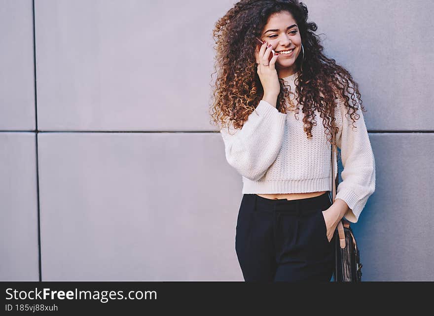 Millennial Caucasian female tourist connecting to roaming for making international mobile conversation and talking with family. Millennial Caucasian female tourist connecting to roaming for making international mobile conversation and talking with family