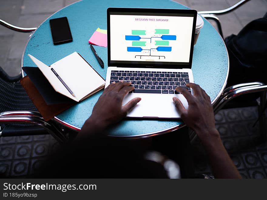 Male student e learning education infographics using laptop