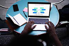 Male Student E Learning Education Infographics Using Laptop Stock Image