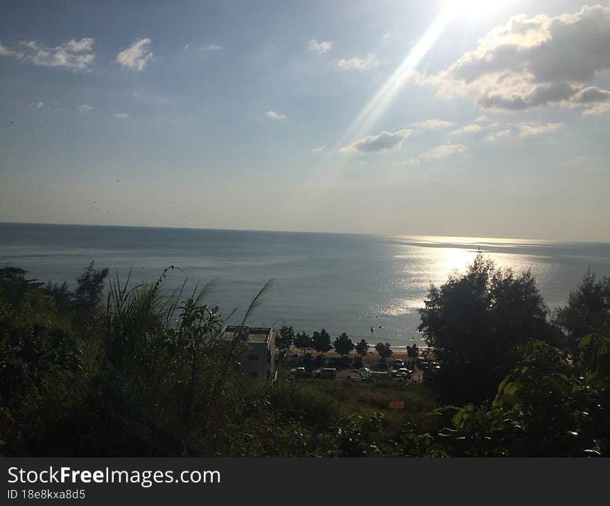 Sunset on the seashore of the Gulf of Thailand. Peaceful atmosphere. looking down from the top of the mountain