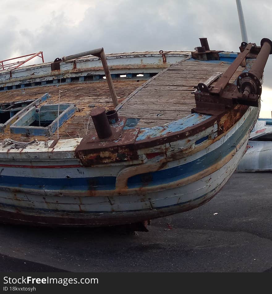 boat of migration in the port of pozzallo sicilia