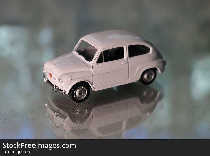 Fiat 500 White Diecast Model, Blurred Background