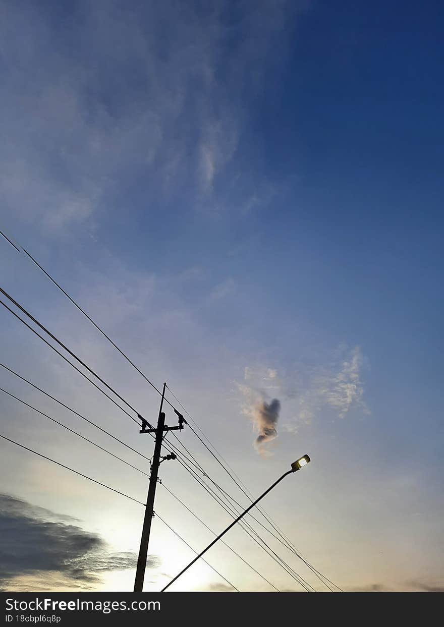 a cloud shape similar to a dancing person