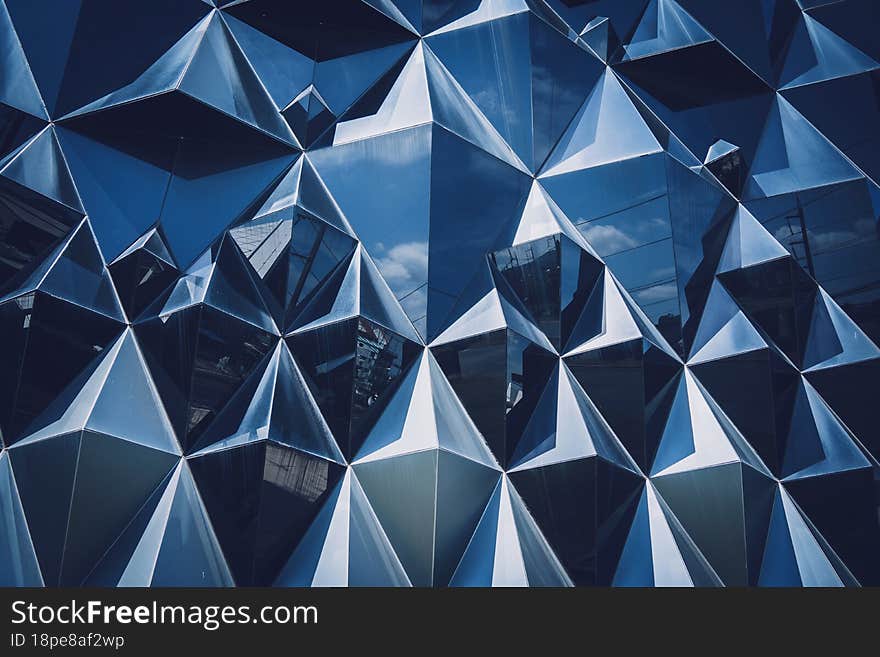 Abstract geometric background with triangles and buildings cells.
