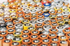 Close Up Of Positive Ends Of Colorful Discharged Batteries Of Different Sizes And Formats, Top View, Selective Focus. Royalty Free Stock Photography