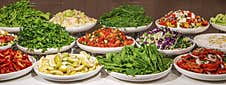 Delicious And Fresh Salats With Various Fruits And Vegetables Stock Images