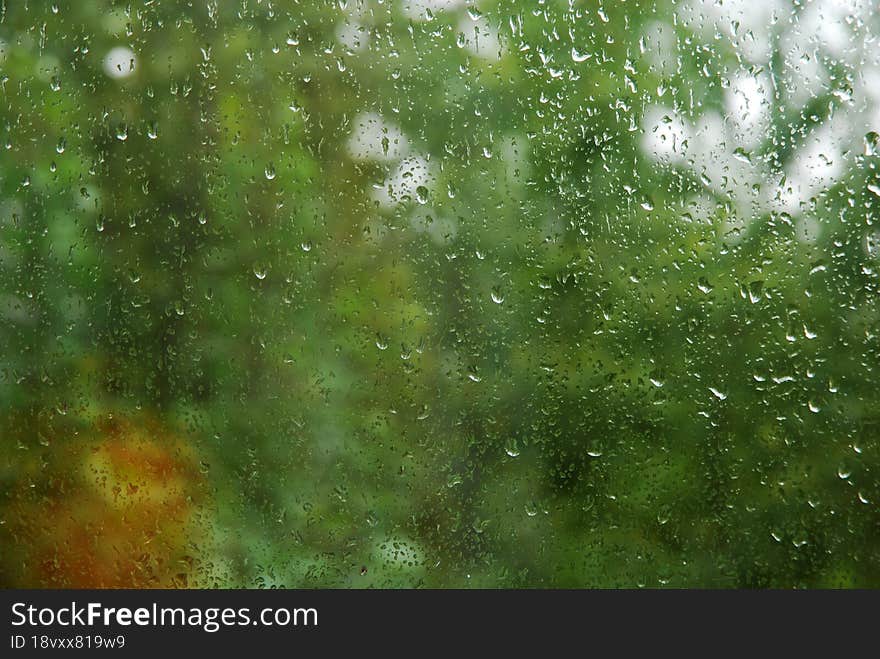 Raindrops on the glass.