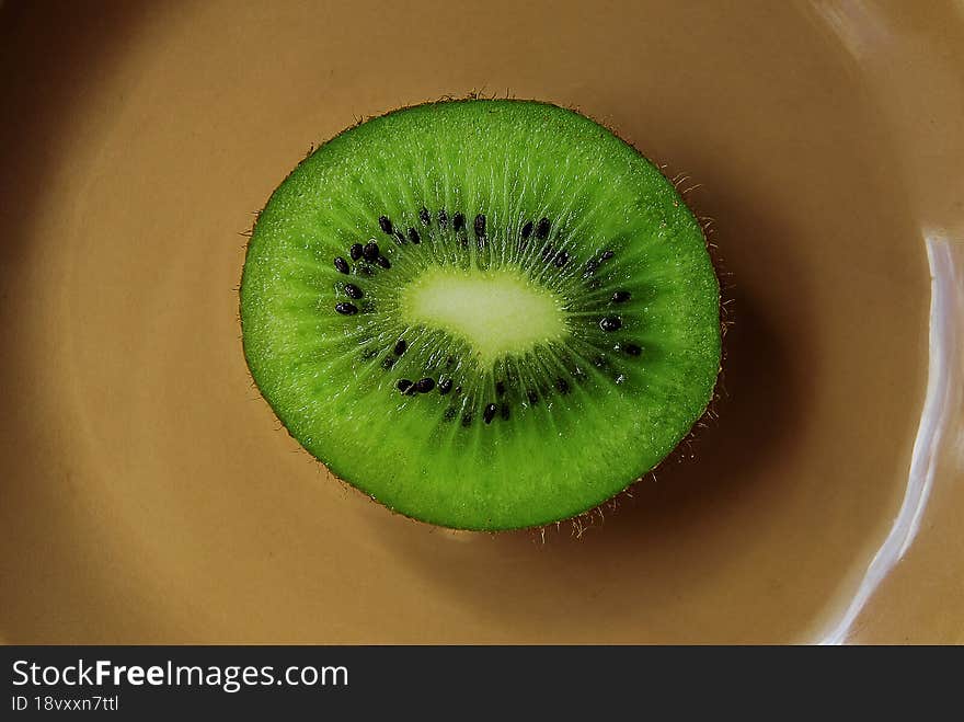 A piece of ripe kiwi.