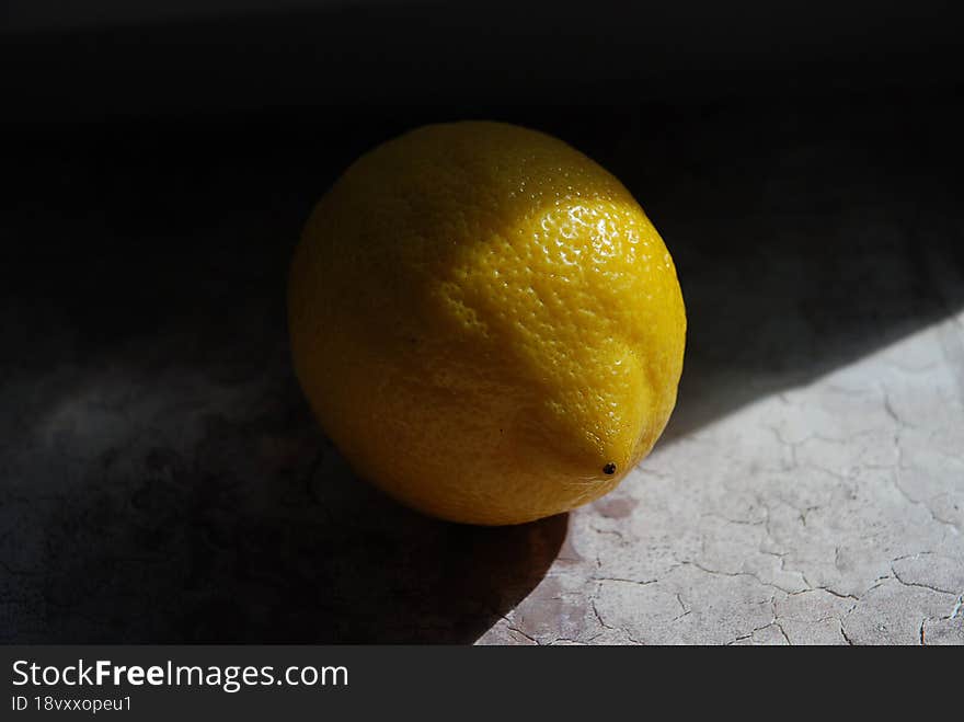 Lemon in the rays of light.