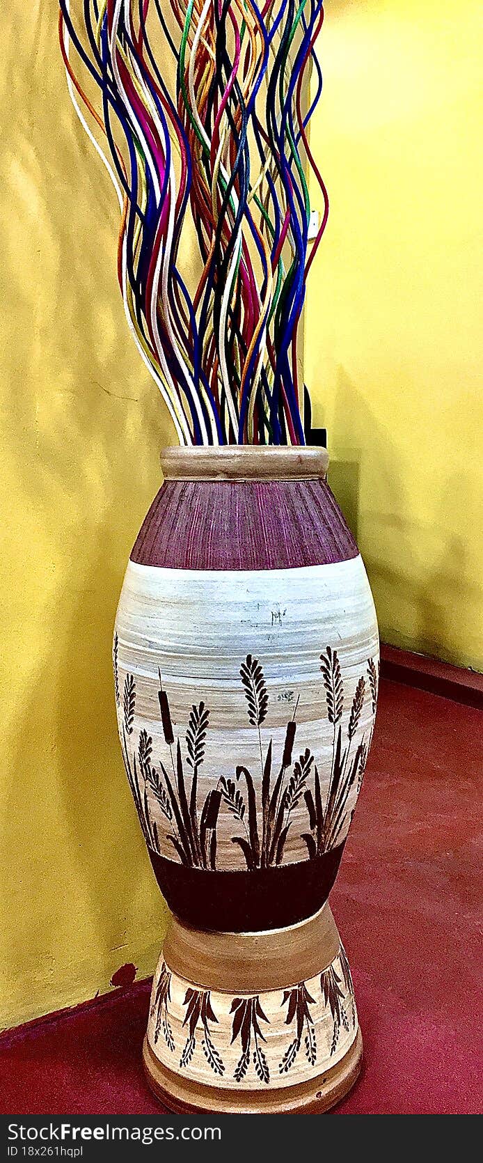 Ornately Colored Canes Clay Pot Beautiful Background