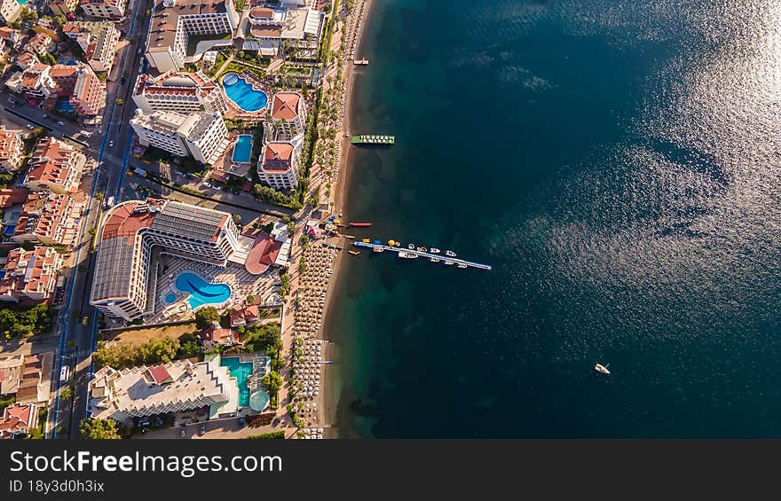 Beautiful seashore. Islands in the distance. Colorful blue sea. The beauty of Turkey. Beautiful rocks and mountains. Sunny clear day. Beautiful water.