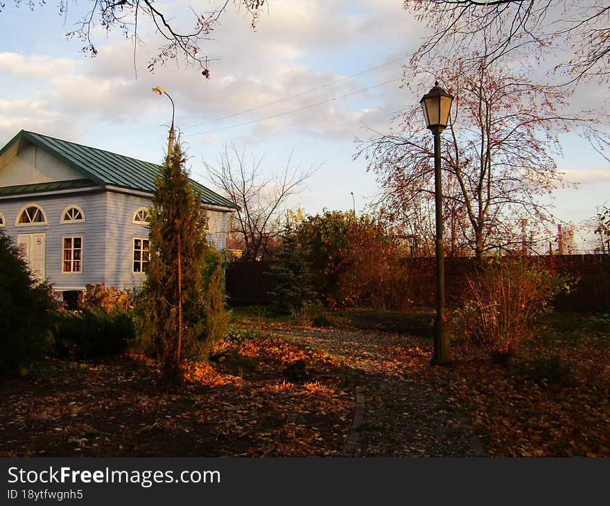 blue house with a lantern