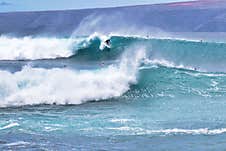 Barely Visible Surfer In  La Perouse On Maui Stock Photos