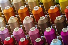 Close Up Scene The Colorful Group Of The The Spool For Industry Sawing Machine Royalty Free Stock Photography