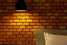 The Ceiling Lamp With The Red Brick Wall Background Stock Images