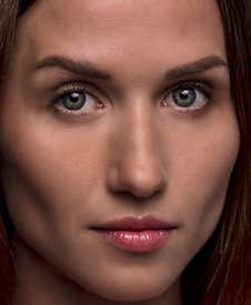 Portrait Of A Young Attractive Woman On A Dark Background Royalty Free Stock Images