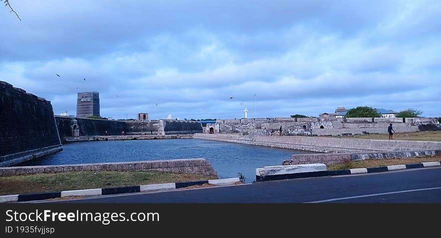 his picture shows a view of Jaffna fort& x27 s present view. Jaffna Fort is a fort built by the Portuguese at Jaffna, Sri Lanka, in 1618 under Phillippe de Oliveira following the Portuguese invasion of Jaffna. it is a main tourist attraction in Sri Lanka.  sea coast bay shore harbor waterway ocean tower dock horizon landmark skyline river vacation ruined ancient fort jaffna sri view fort& x27 s portuguese lanka 1618 phillippe tourist attraction