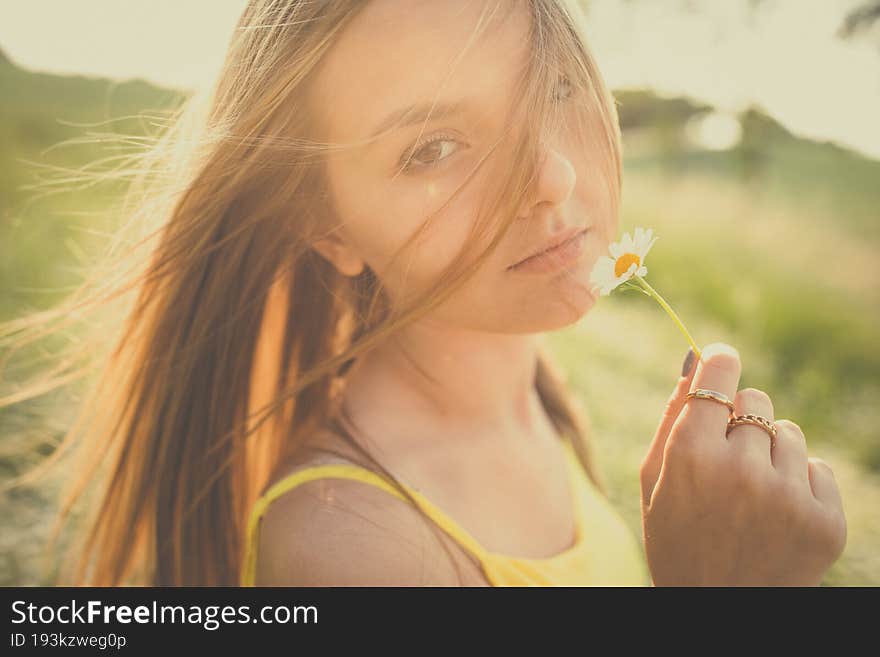 Portrait of young, pretty  woman outdoor