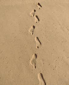 Foot Print Impression On The Sand In A Seashore Royalty Free Stock Photography