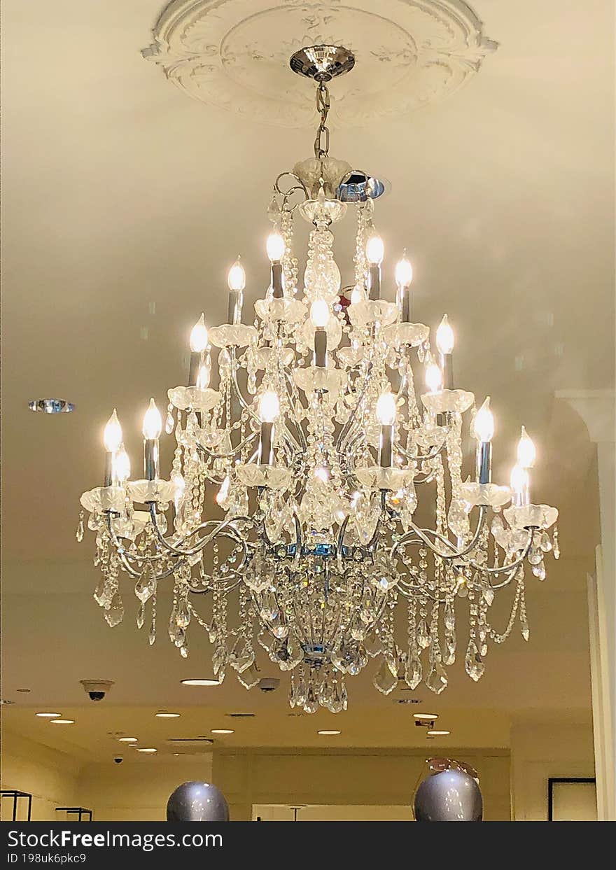 Crystal hanging chandelier with candle like lightbulbs