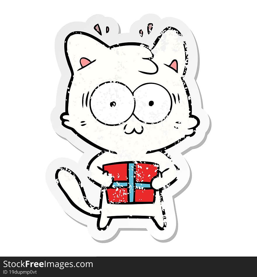 distressed sticker of a cartoon surprised cat with christmas present