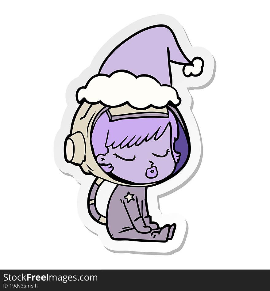 hand drawn sticker cartoon of a pretty astronaut girl sitting waiting wearing santa hat