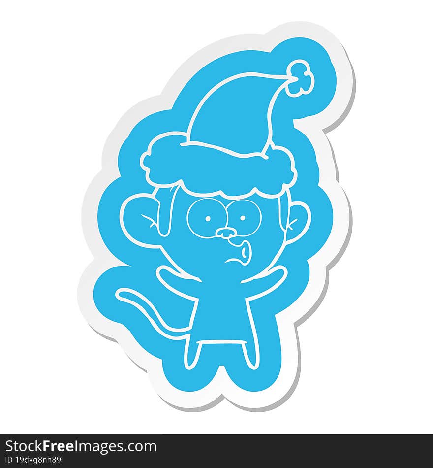 cartoon  sticker of a surprised monkey wearing santa hat