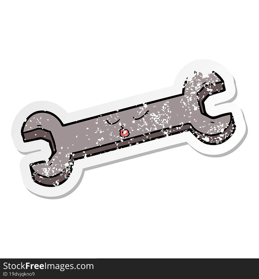 distressed sticker of a cartoon spanner