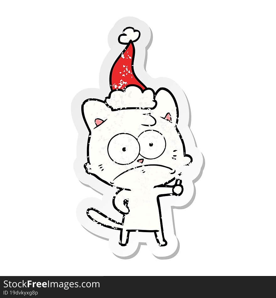 distressed sticker cartoon of a nervous cat wearing santa hat