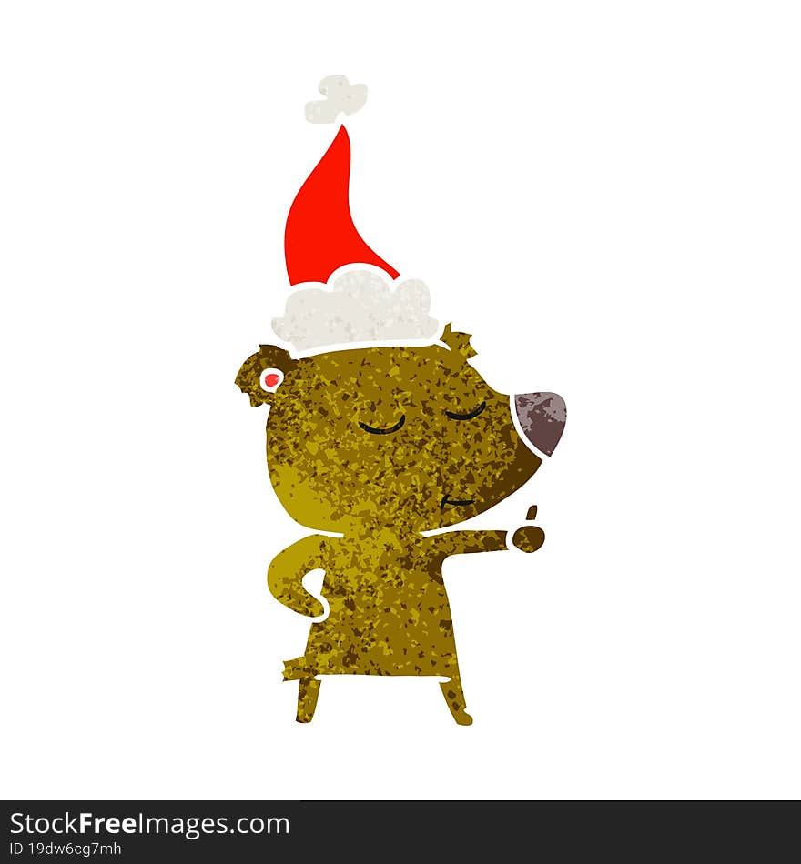 happy retro cartoon of a bear giving thumbs up wearing santa hat