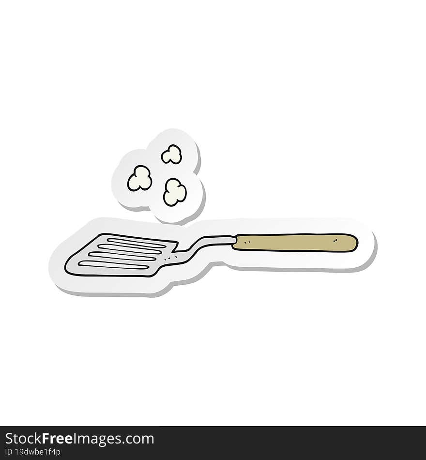 sticker of a cartoon spatula