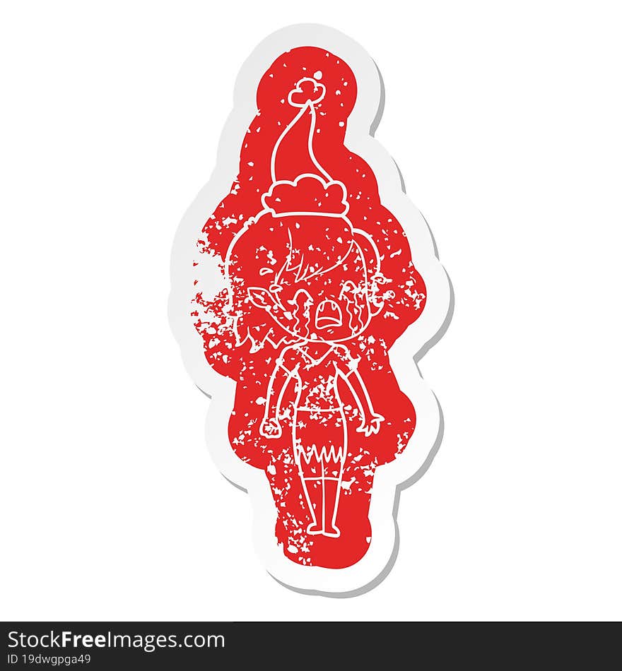 cartoon distressed sticker of a crying vampire girl wearing santa hat