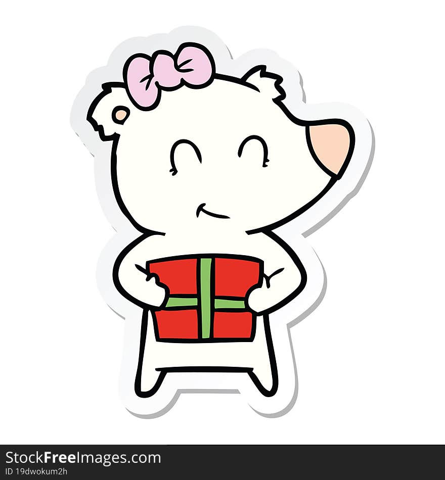 sticker of a female polar bear with christmas present