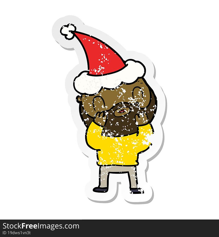 distressed sticker cartoon of a bearded man wearing santa hat