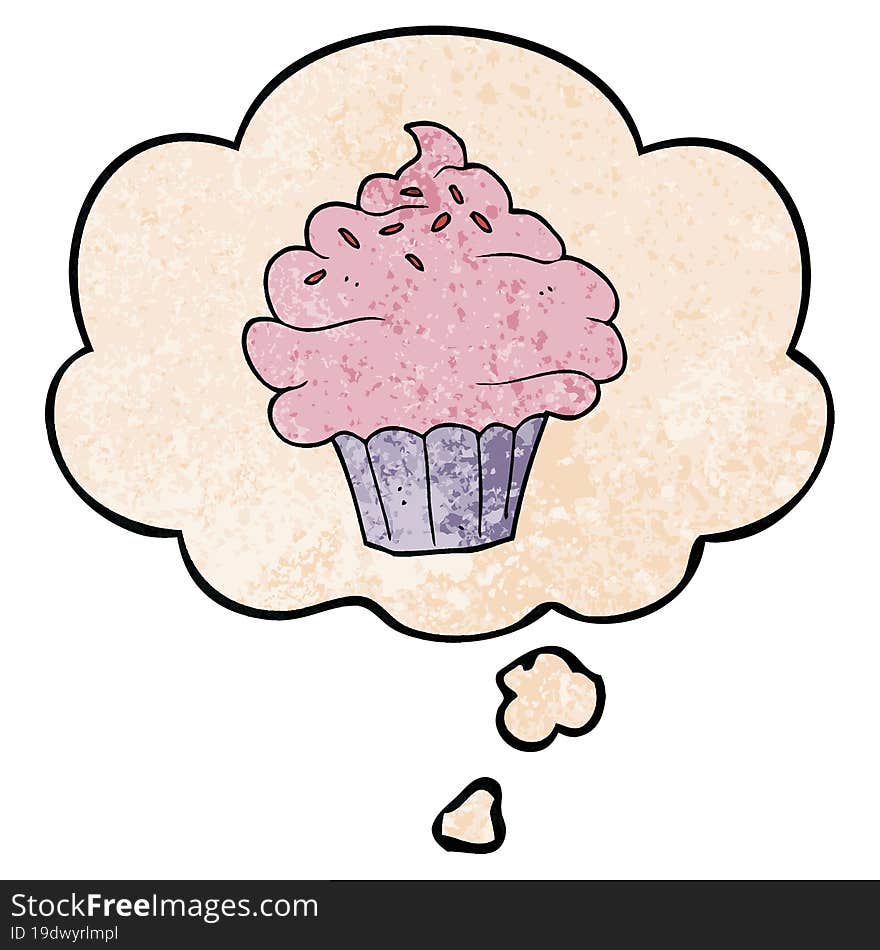 cartoon cupcake with thought bubble in grunge texture style. cartoon cupcake with thought bubble in grunge texture style