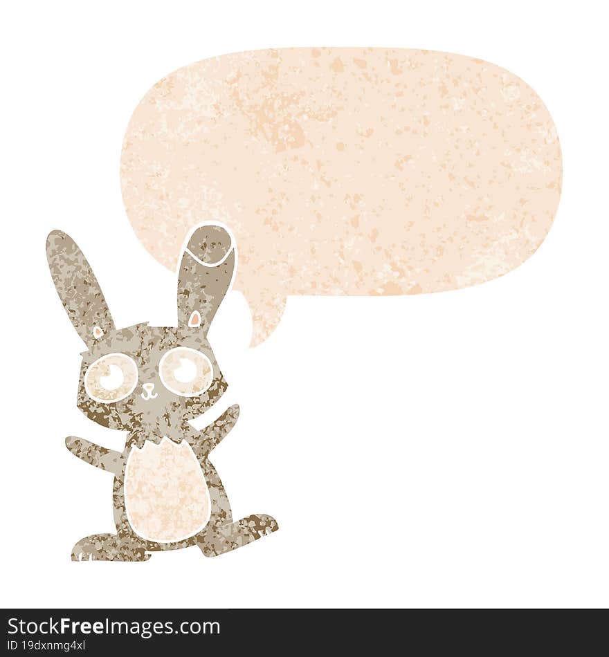 cute cartoon rabbit and speech bubble in retro textured style