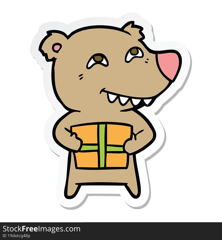 sticker of a cartoon bear with present