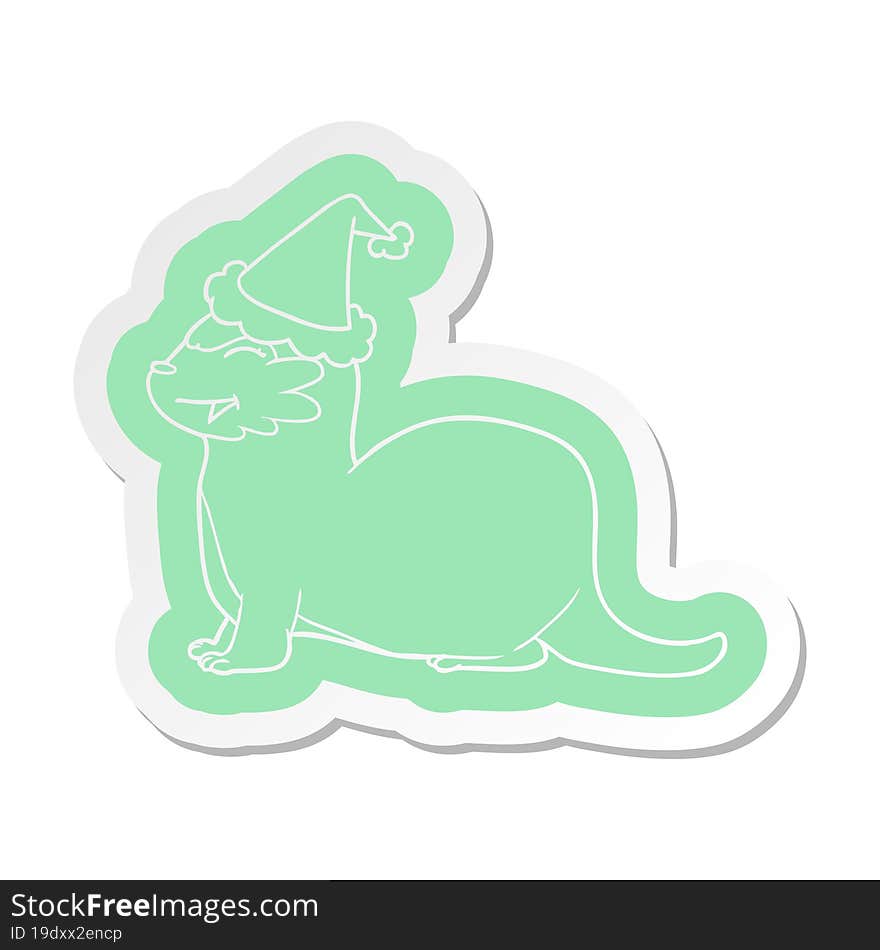 laughing otter cartoon  sticker of a wearing santa hat