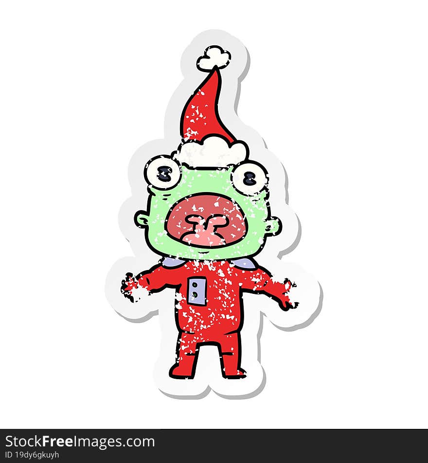 Distressed Sticker Cartoon Of A Weird Alien Communicating Wearing Santa Hat